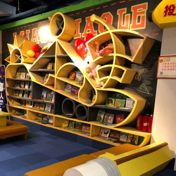 Chiquitos Ocean themed bookcase wall in kindergarten early education center Ship shape Special shape customization bookcase
